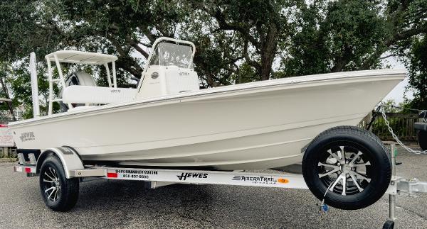 Hewes 16 Redfisher 2025 Hewes 16 Redfisher boat on trailer, parked outdoors.