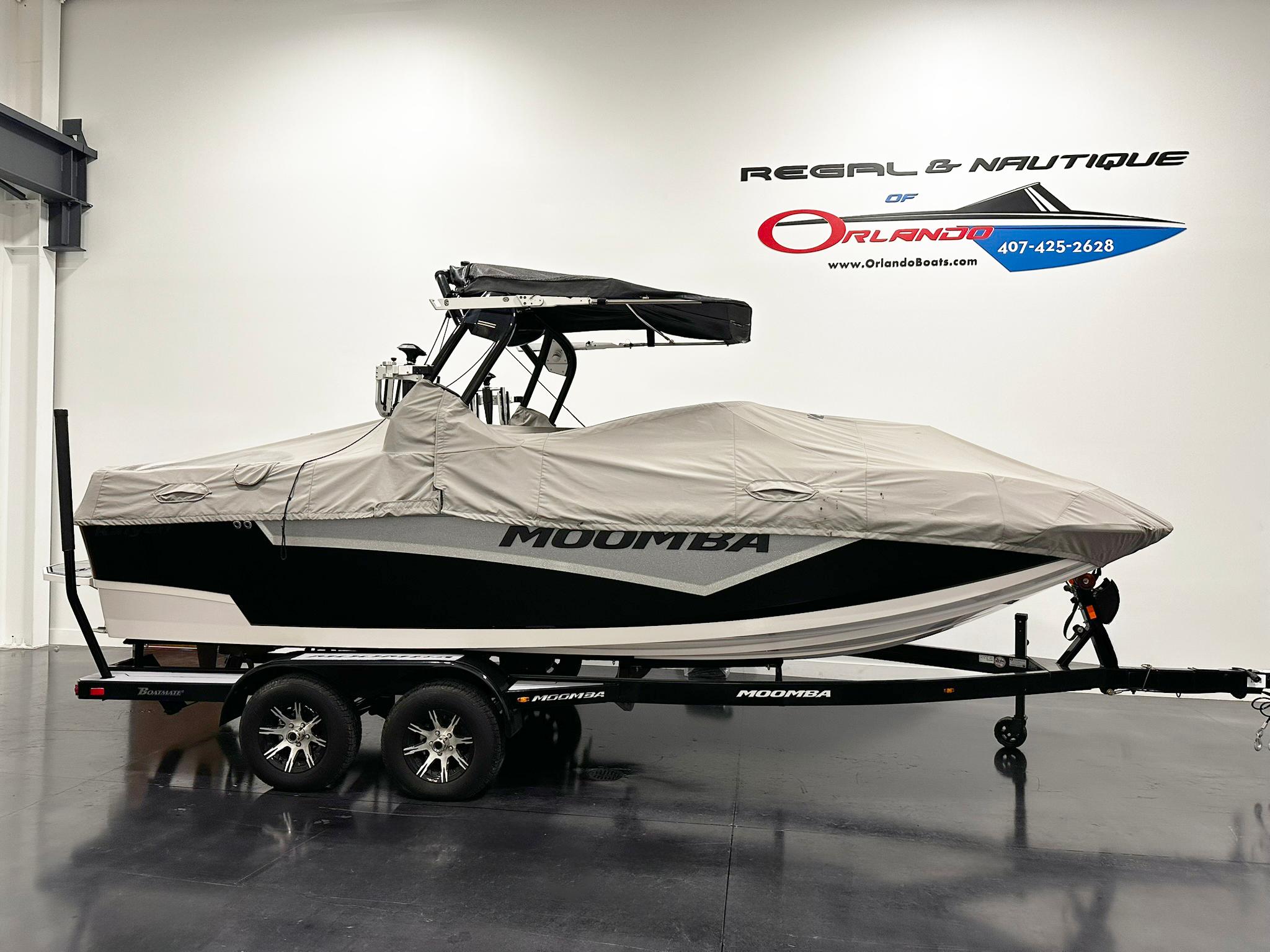 Moomba Kaiyen 2021 Moomba Kaiyen boat covered on trailer in showroom.