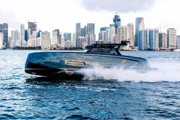 Vanquish Yachts 45 T-TOP Vanquish Yachts 2022 45 T-TOP cruising with city skyline backdrop.