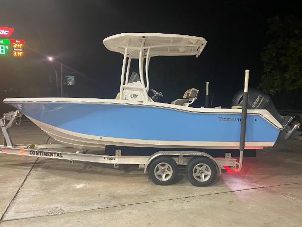Tidewater 210 LXF 2021 Tidewater 210 LXF boat on a Continental trailer at night.
