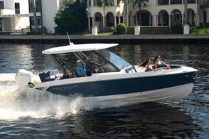 Monterey Elite 27 OB Manufacturer Provided Image: 2026 Monterey Elite 27 OB boat cruising on water with passengers enjoying the ride.