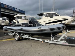 Brig Eagle 6 2022 Brig Eagle 6 inflatable boat on trailer at marina.
