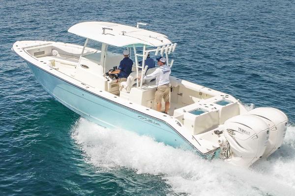 Cobia 320 Center Console 2020 Cobia 320 Center Console boat cruising on open water.