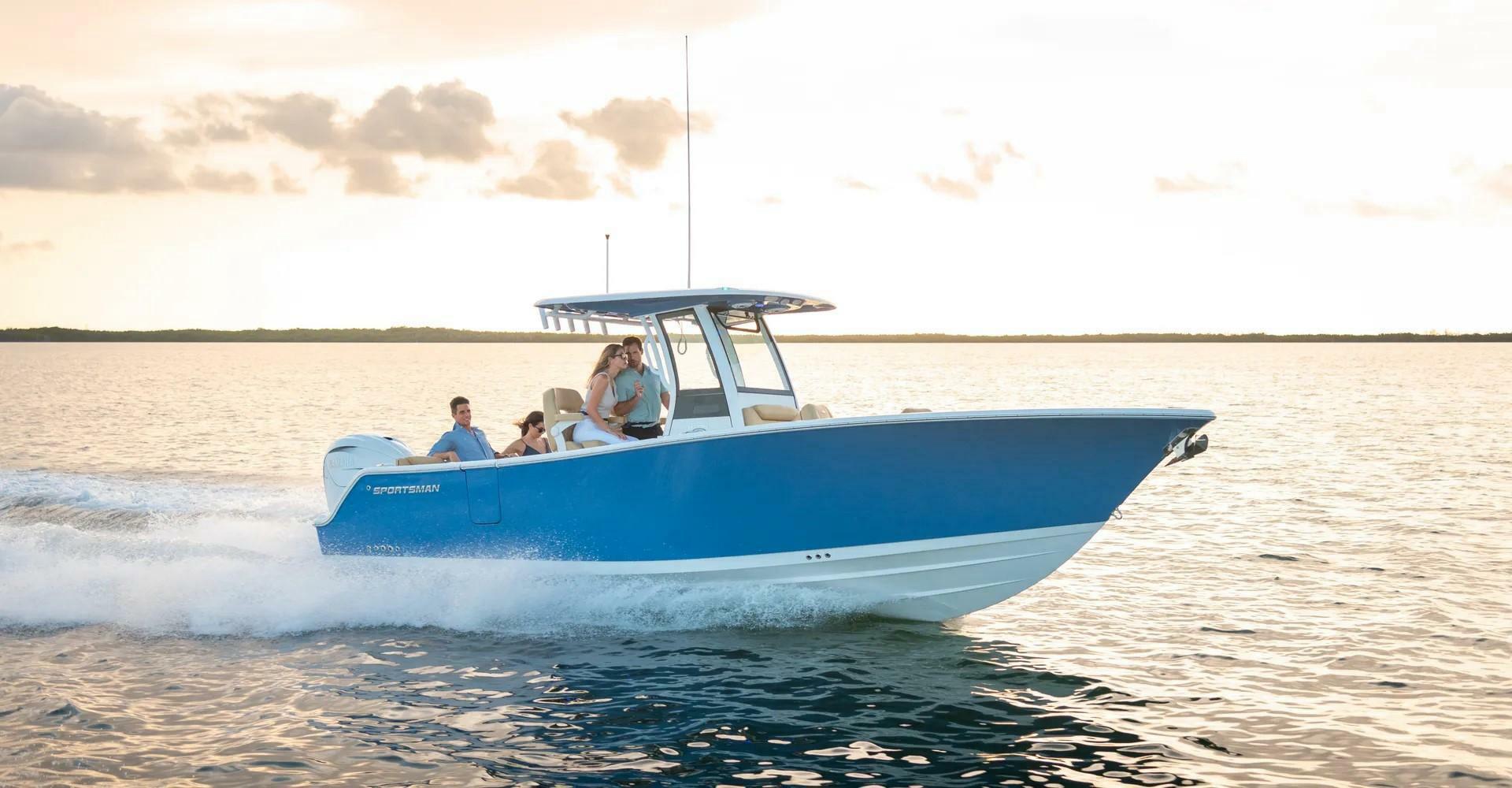 Sportsman 261 Heritage 2025 Sportsman 261 Heritage boat cruising on open water at sunset.