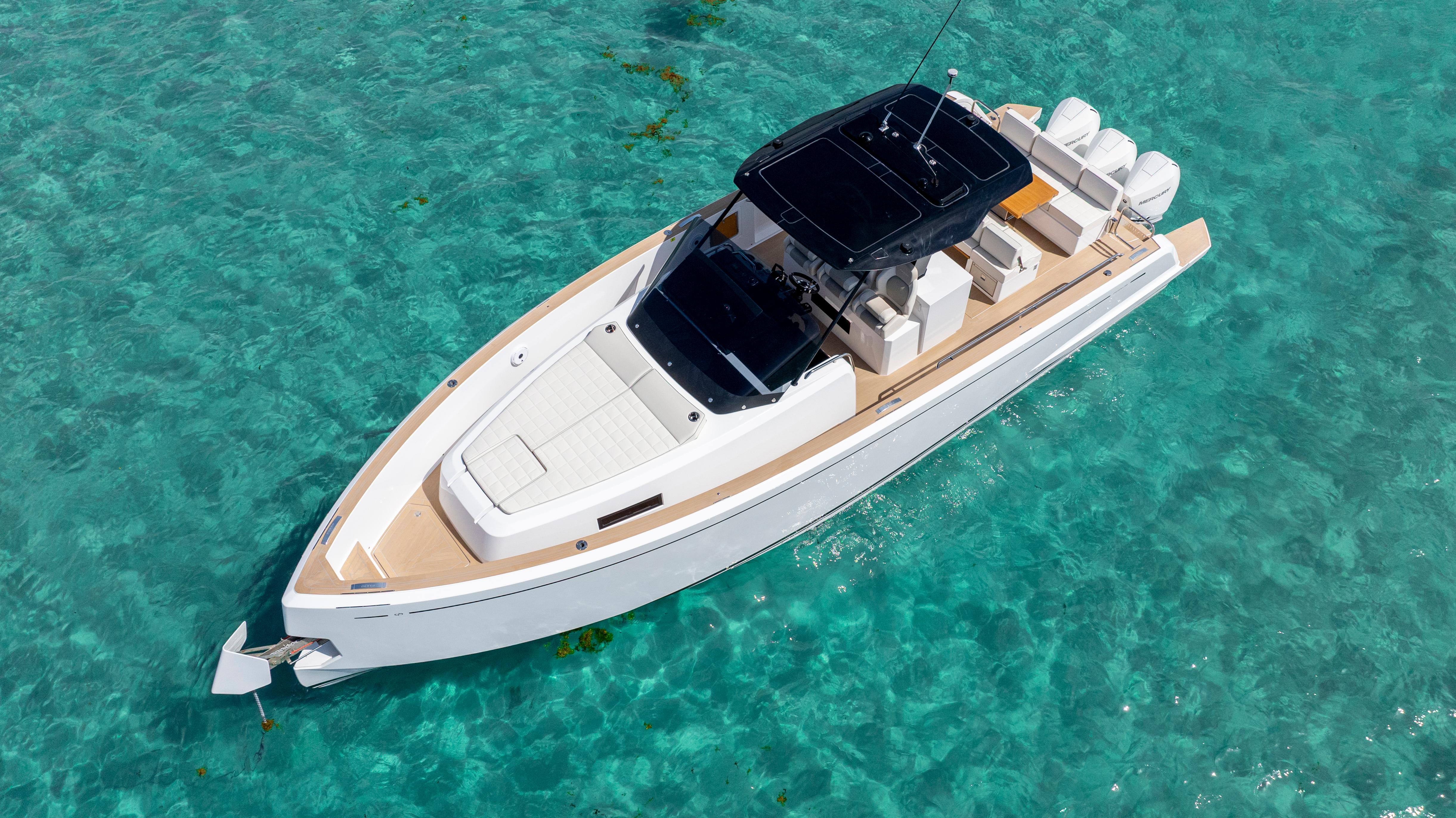 Pardo Yachts P38 2025 Pardo Yachts P38 cruising on clear turquoise waters.