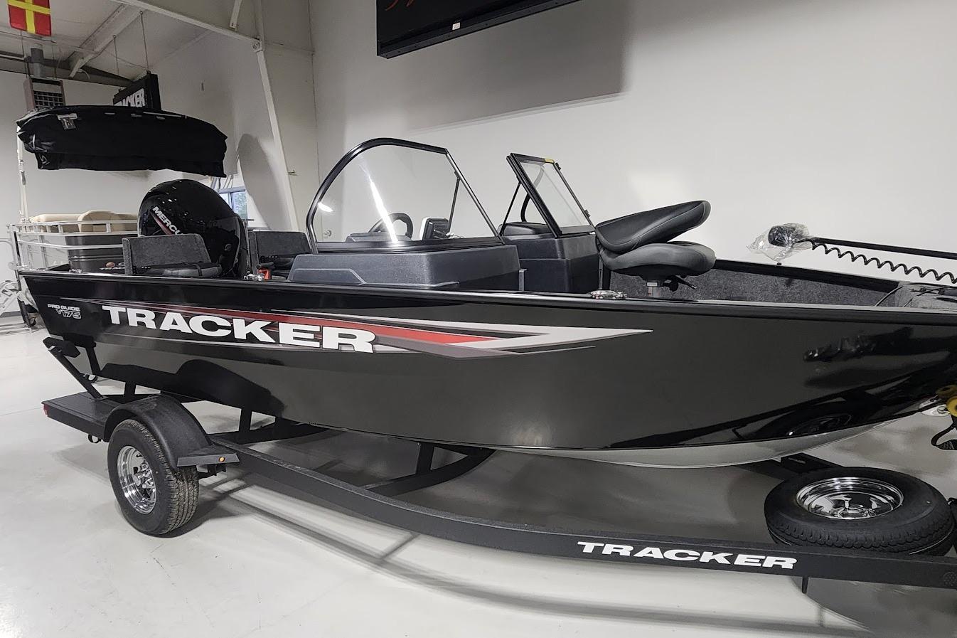 Tracker Pro Guide V-175 Combo 2025 Tracker Pro Guide V-175 Combo boat on trailer in showroom.