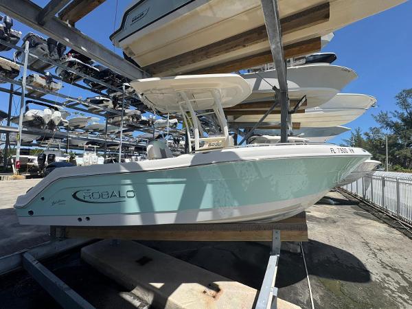 Robalo R222 Center Console 2017 Robalo R222 Center Console boat in storage, side view.