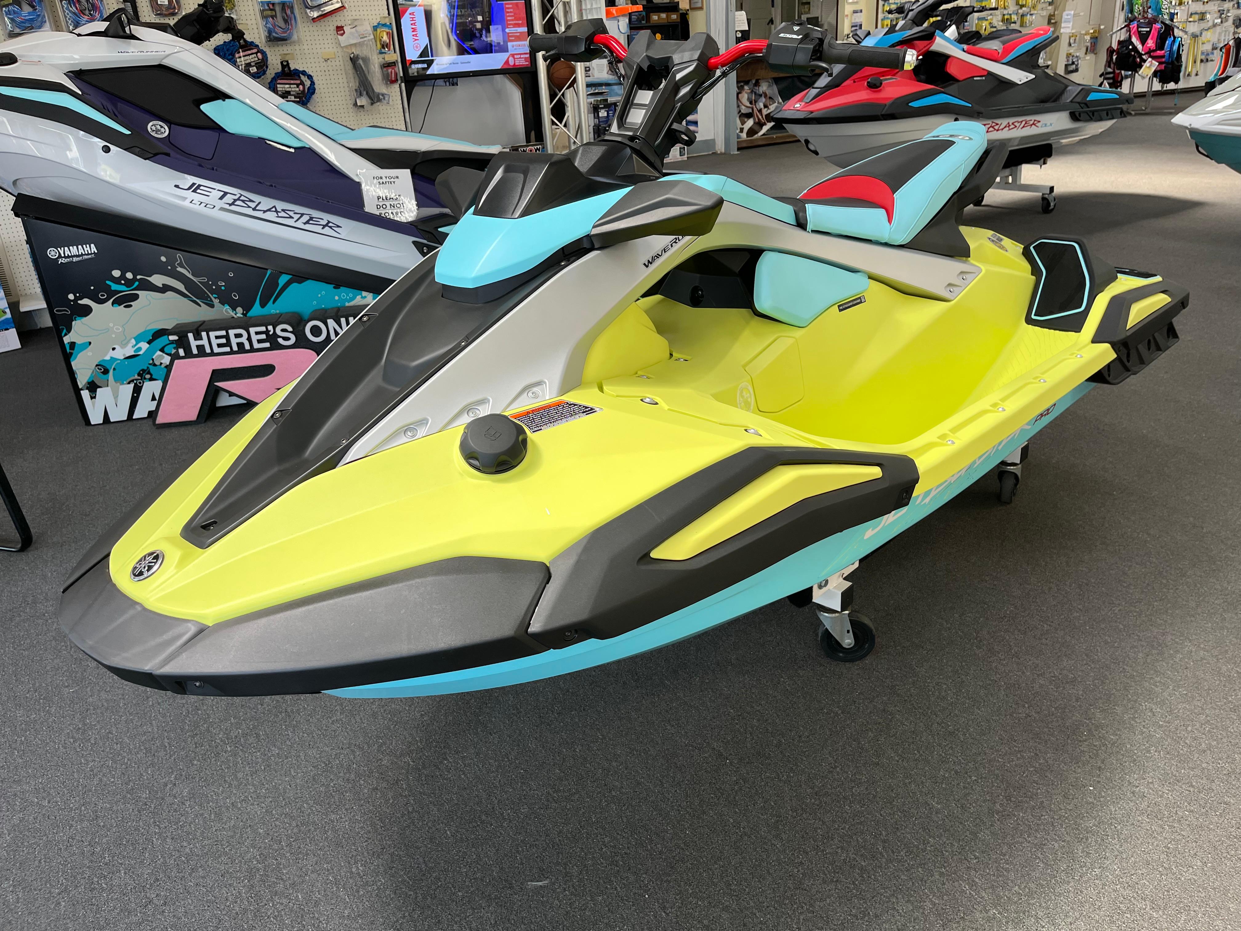 Yamaha WaveRunner JetBlaster PRO 3-Up 2025 Yamaha WaveRunner JetBlaster PRO 3-Up in showroom, vibrant yellow and blue design.