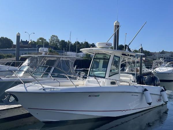 Boston Whaler 280 Outrage 2012 Boston Whaler 280 Outrage boat docked at marina.