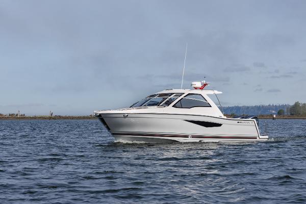 Solara S-310 Sport Coupe 2026 Solara S-310 Sport Coupe cruising on open water.