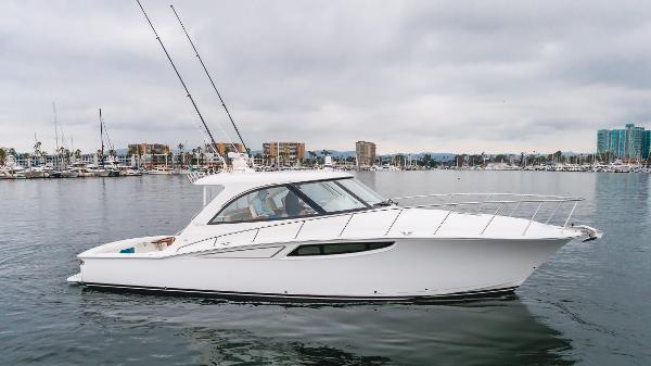 Mag Bay 42 Express 2023 Mag Bay 42 Express yacht on calm water, showcasing sleek design and modern features.