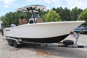 Sea Pro 242 Center Console 2024 Sea Pro 242 Center Console boat on trailer, parked outdoors.