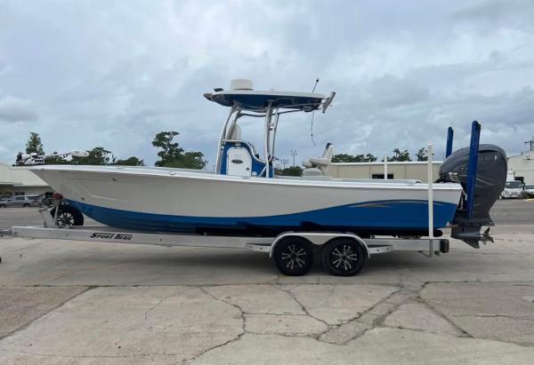Blue Wave 2800 Pure Bay 2019 Blue Wave 2800 Pure Bay boat on trailer, side view.