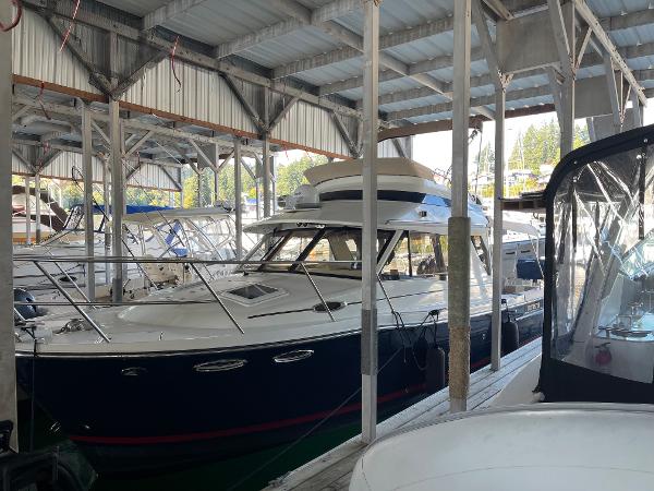 Cutwater 30 CB 2015 Cutwater 30 CB boat docked in a covered marina.