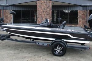 Skeeter ZX150 2020 Skeeter ZX150 boat with sleek design parked outside a brick building.