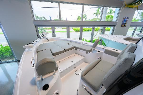 Sportsman Masters 267 Bay Boat 2025 Sportsman Masters 267 Bay Boat interior with cushioned seating and modern design.