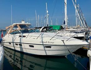 Sealine S38 2006 Sealine S38 yacht named "Cloud Nine" docked in a marina.
