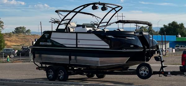 Montara Surf Boss 2.0 2022 Montara Surf Boss 2.0 boat on trailer in outdoor setting.
