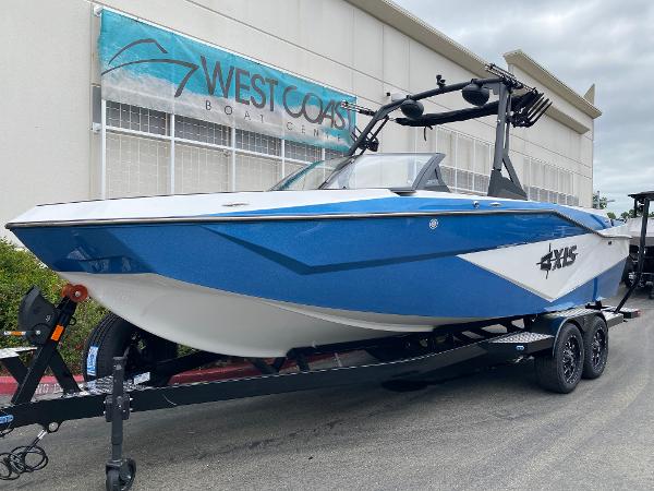 Axis T250 2025 Axis T250 boat in blue and white on trailer at West Coast Boat Center.