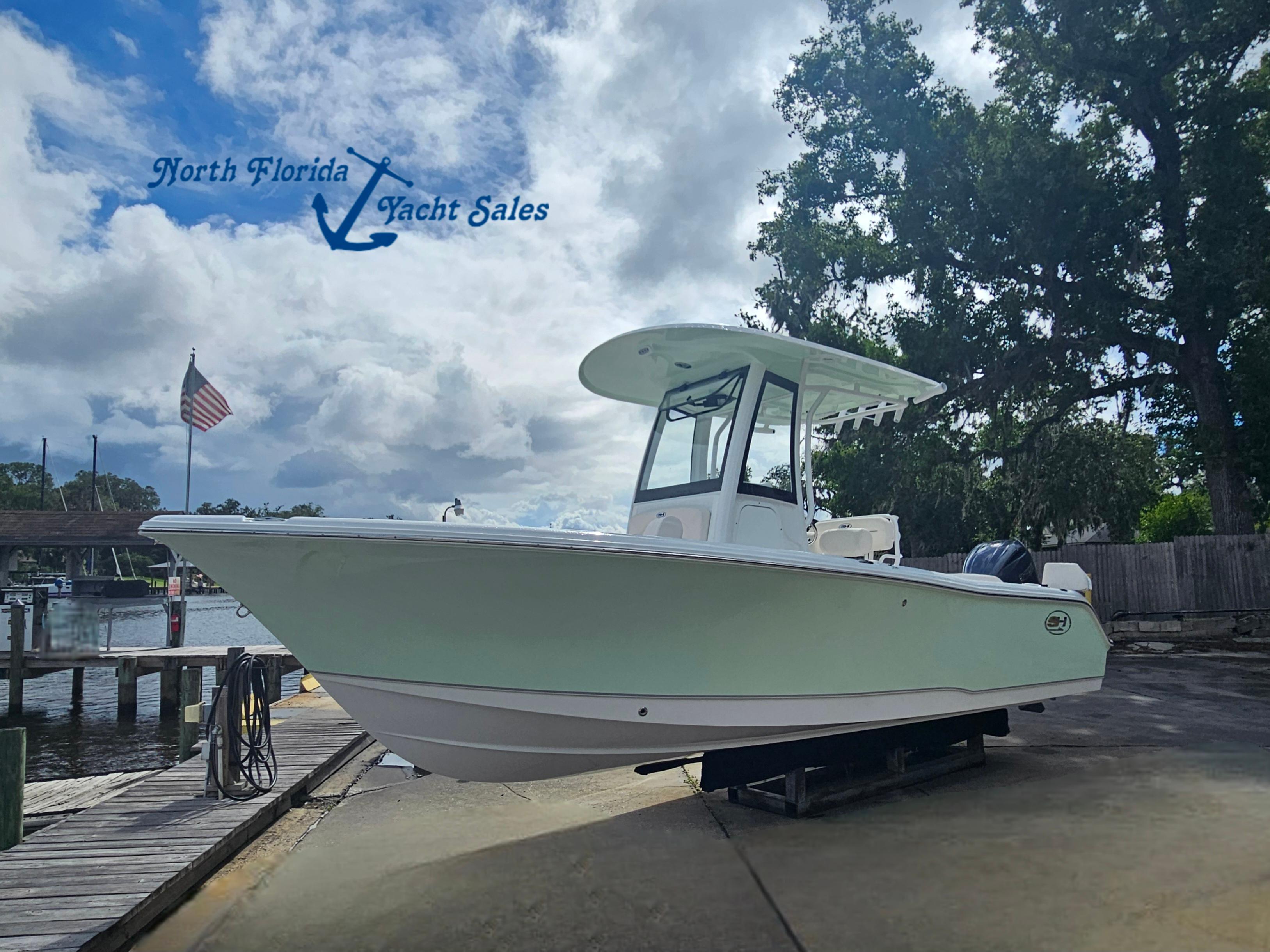 Sea Hunt Ultra 235 SE 2026 Sea Hunt Ultra 235 SE boat at North Florida Yacht Sales dock.