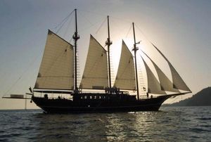 Gulet 35 M WITH 8 CABINS Sailing yacht Gulet 35M with 8 cabins, silhouetted against sunset, 2007 model.