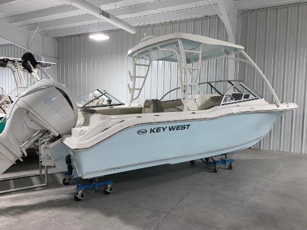 Key West 239 DFS 2024 Key West 239 DFS boat in a showroom.