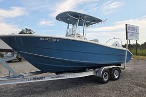 Bulls Bay 230 Center Console 2022 Bulls Bay 230 Center Console boat on trailer, blue hull, parked outdoors.