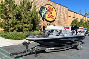 Nitro Z18 Pro 2026 Nitro Z18 Pro boat parked at Bass Pro Shops, featuring sleek design and advanced equipment.