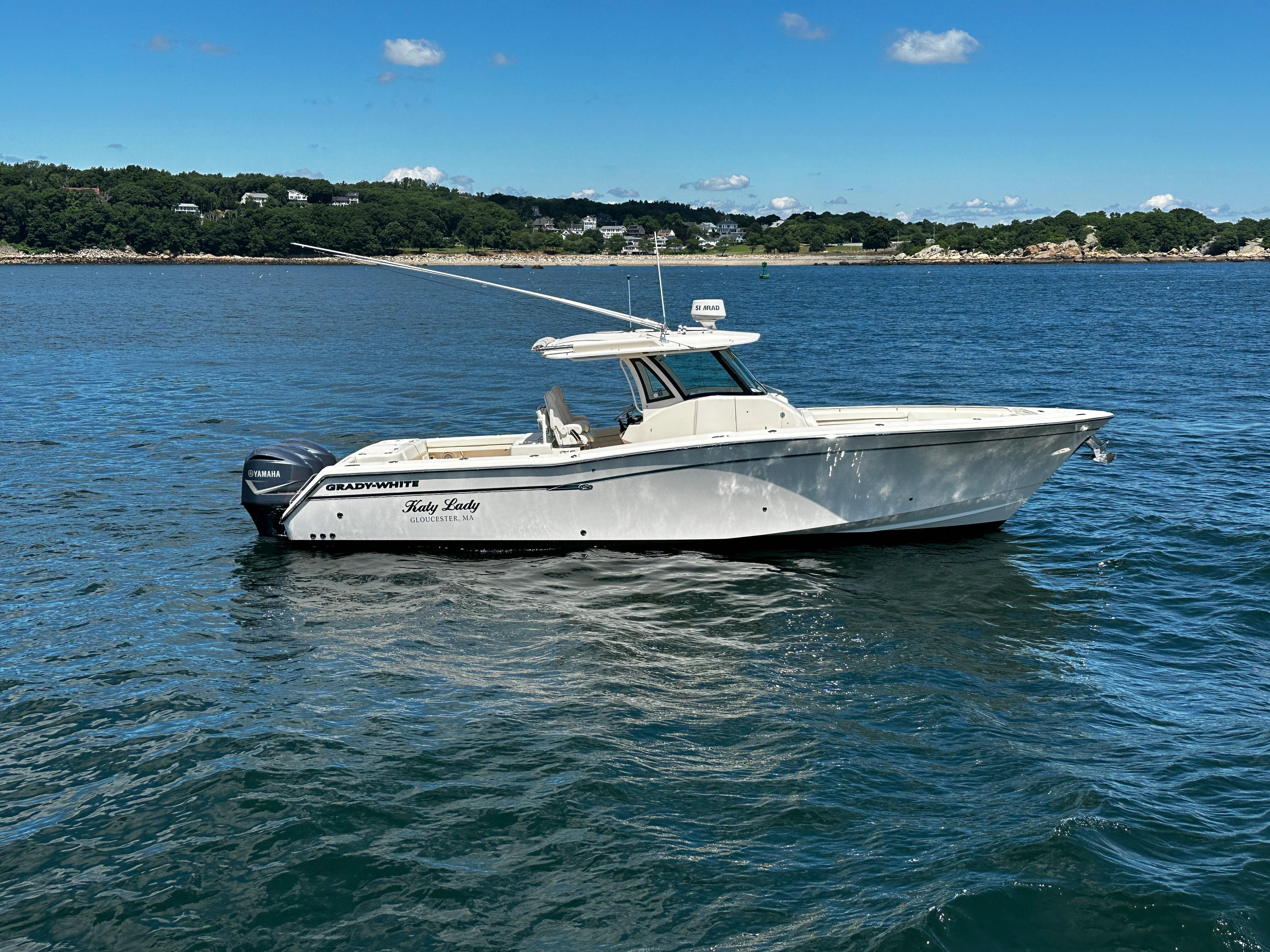 Grady-White Canyon 376 2017 Grady-White Canyon 376 boat on calm water, clear sky, scenic background.