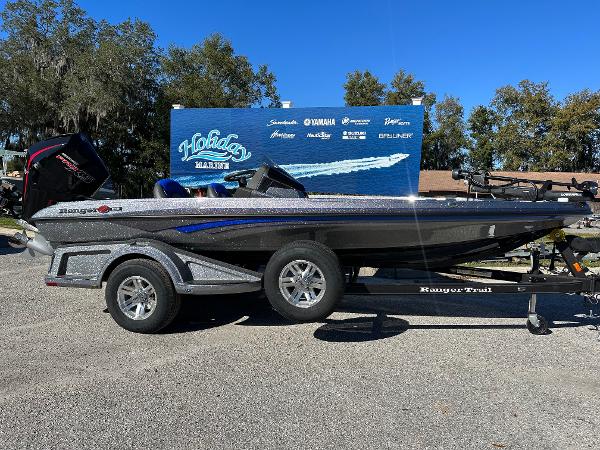Ranger 518 Cup 2024 Ranger 518 Cup boat on trailer, displayed outdoors.