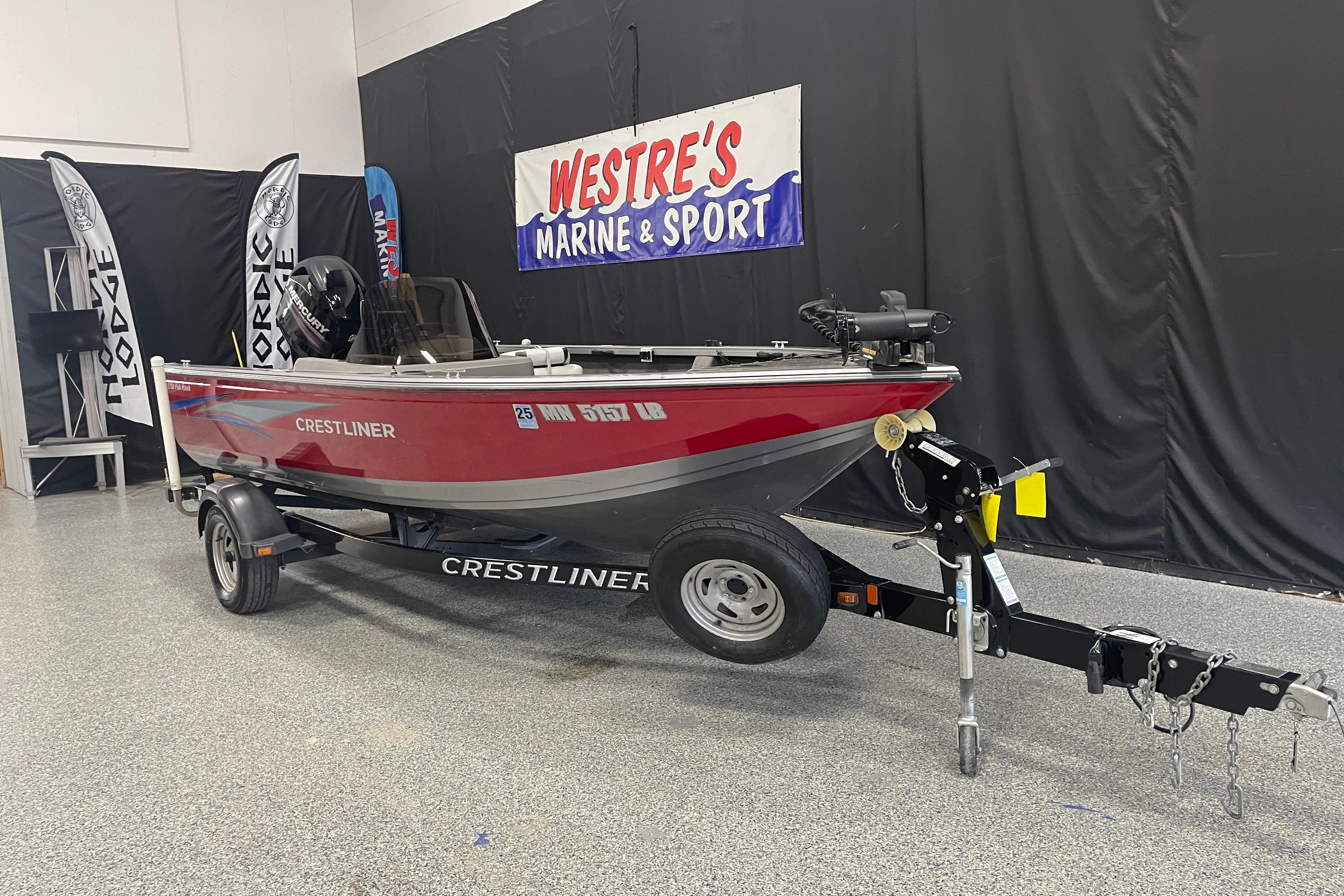 Crestliner 1750 Fish Hawk 2014 Crestliner 1750 Fish Hawk boat on trailer at Westre's Marine & Sport showroom.