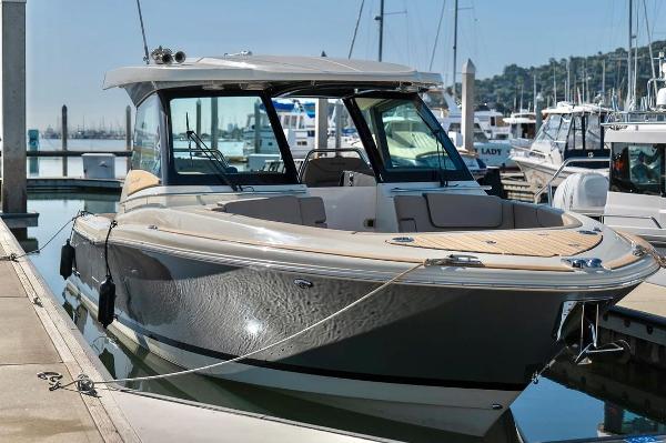 Chris-Craft Calypso 32 2024 Chris-Craft Calypso 32 luxury boat docked at marina.