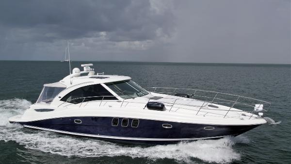 Sea Ray 480 Sundancer 2008 Sea Ray 480 Sundancer yacht cruising on open water under cloudy skies.