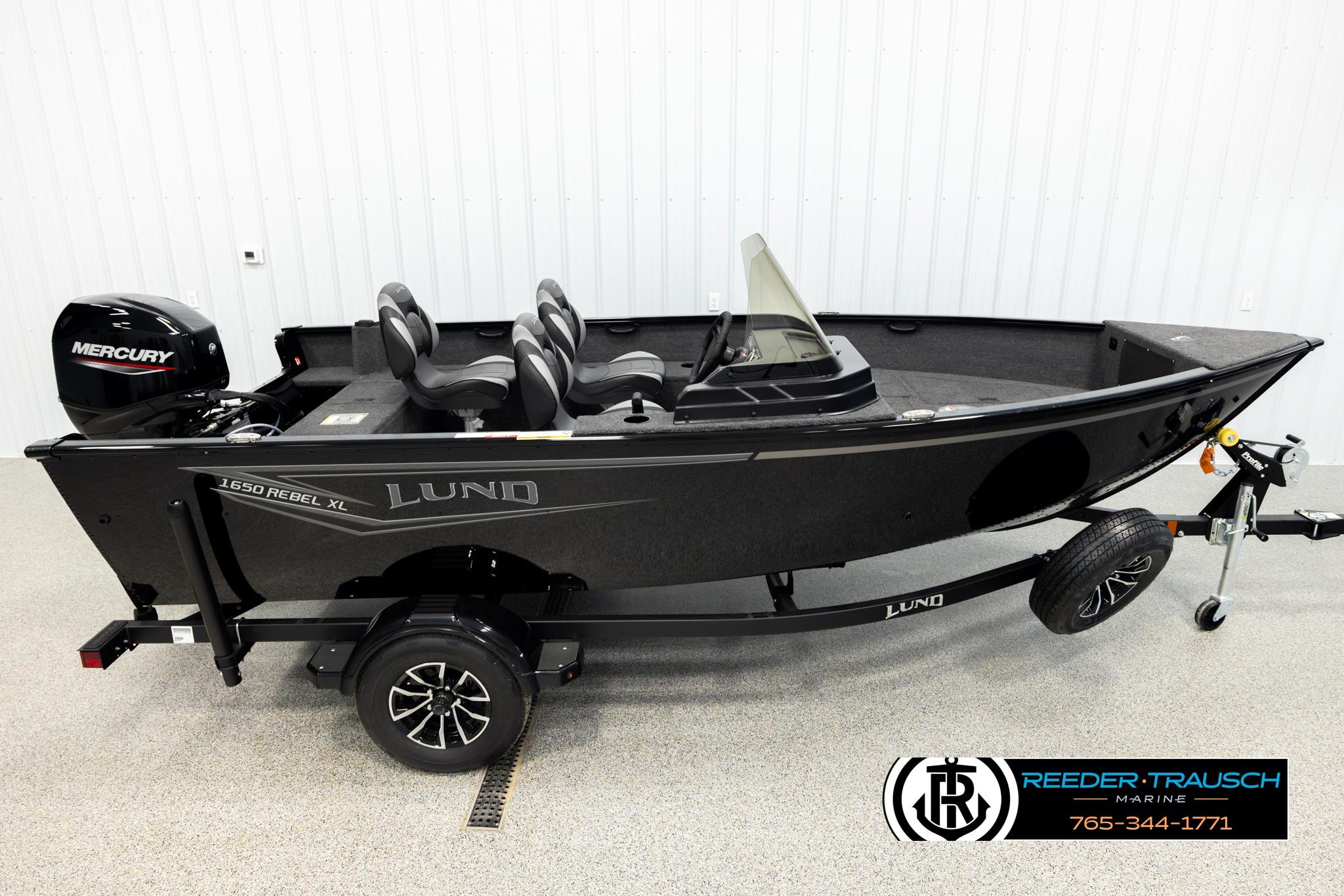 Lund 1650 Rebel XL SS 2026 Lund 1650 Rebel XL SS fishing boat with Mercury engine on trailer.