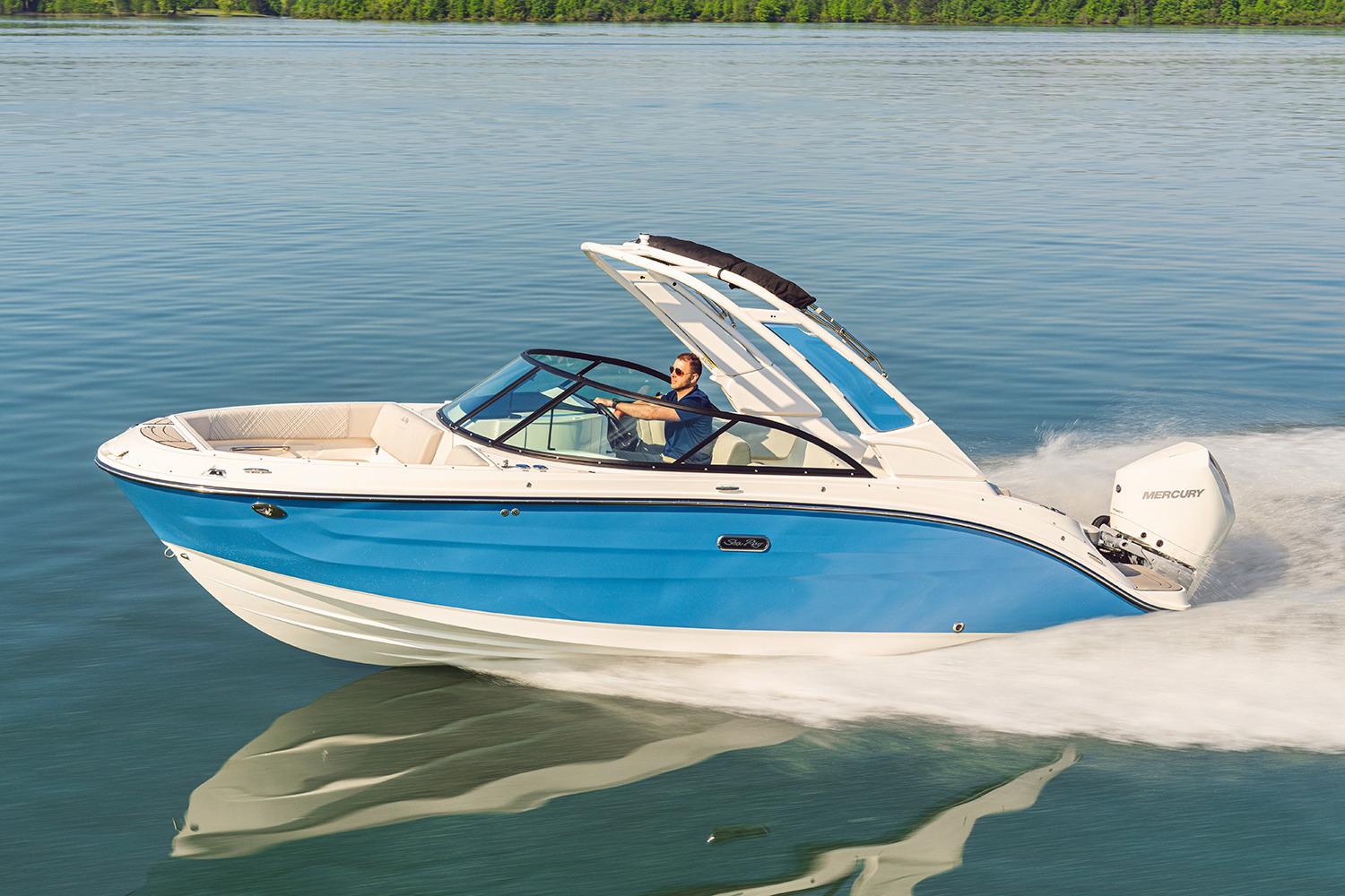 Sea Ray SDX 230 Outboard Manufacturer Provided Image: 2026 Sea Ray SDX 230 Outboard cruising on calm water, showcasing sleek design and performance.