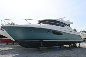 Tiara Yachts C44 Coupe 2017 Tiara 44 Coupe yacht on stands, side view, outdoors.