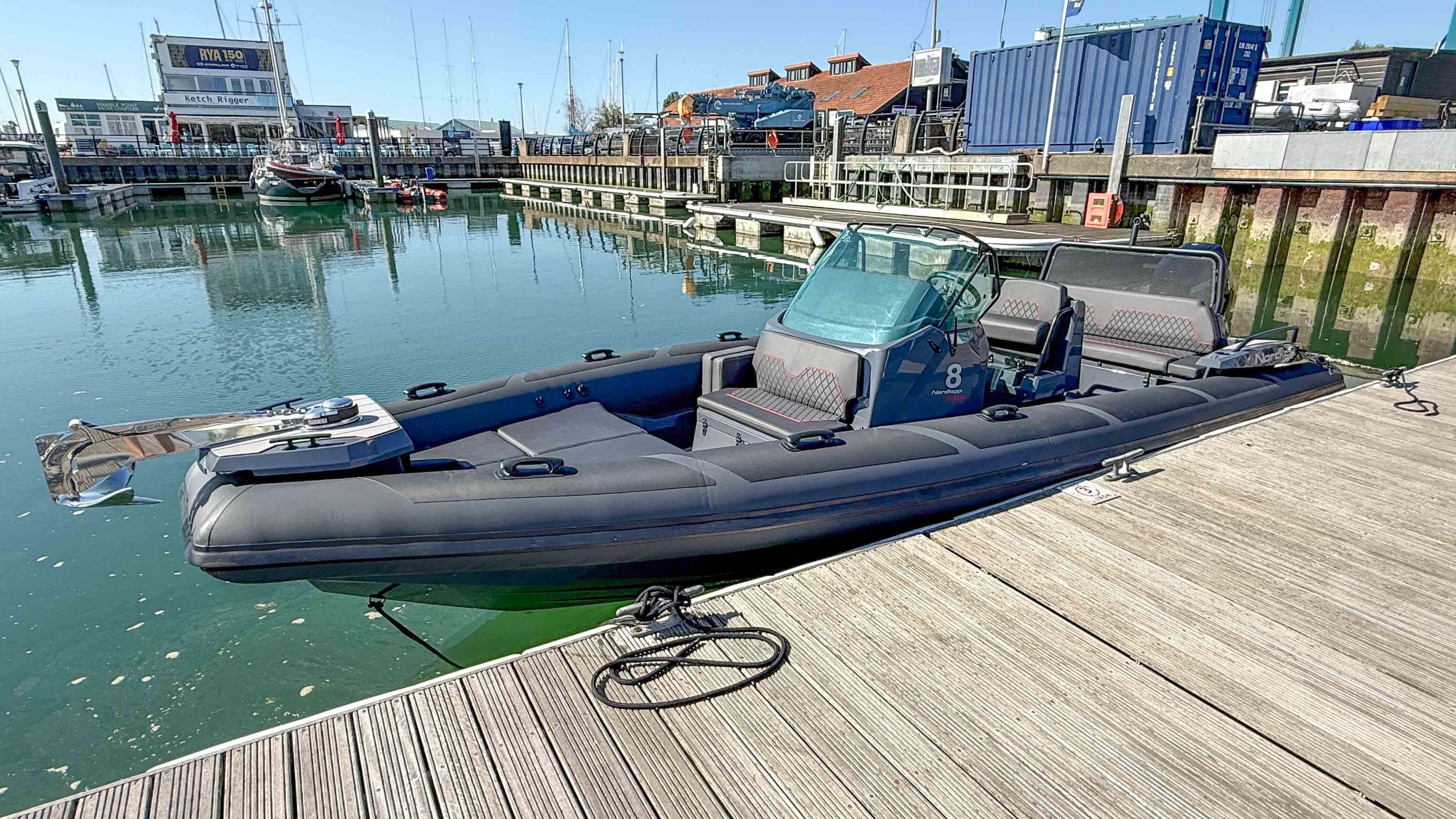 Nordkapp Airborne 2023 Nordkapp Airborne boat docked in a marina, featuring sleek design and modern amenities.