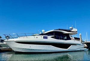 Galeon 470 Sky 2024 Galeon 470 Sky yacht docked under clear blue sky.