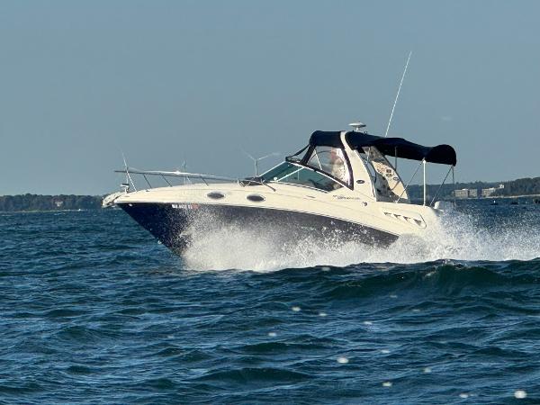 Sea Ray 260 Sundancer 2006 Sea Ray 260 Sundancer cruising on open water.