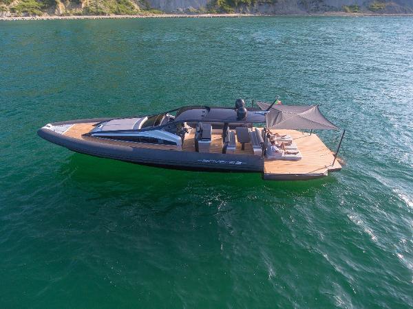 Anvera 58S Anvera 58S 2025 luxury yacht cruising on clear blue water.