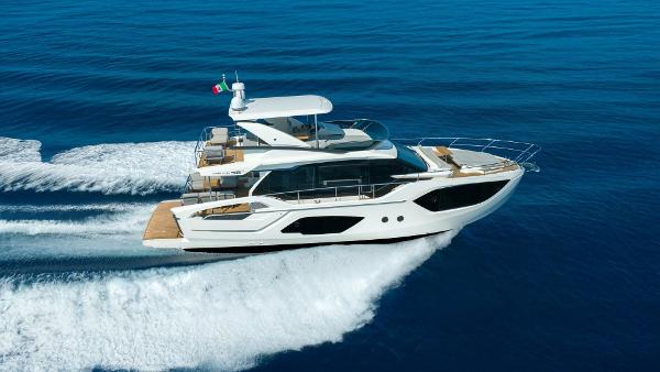 Absolute 52 FLY 2026 Absolute 52 FLY yacht cruising on open blue sea.