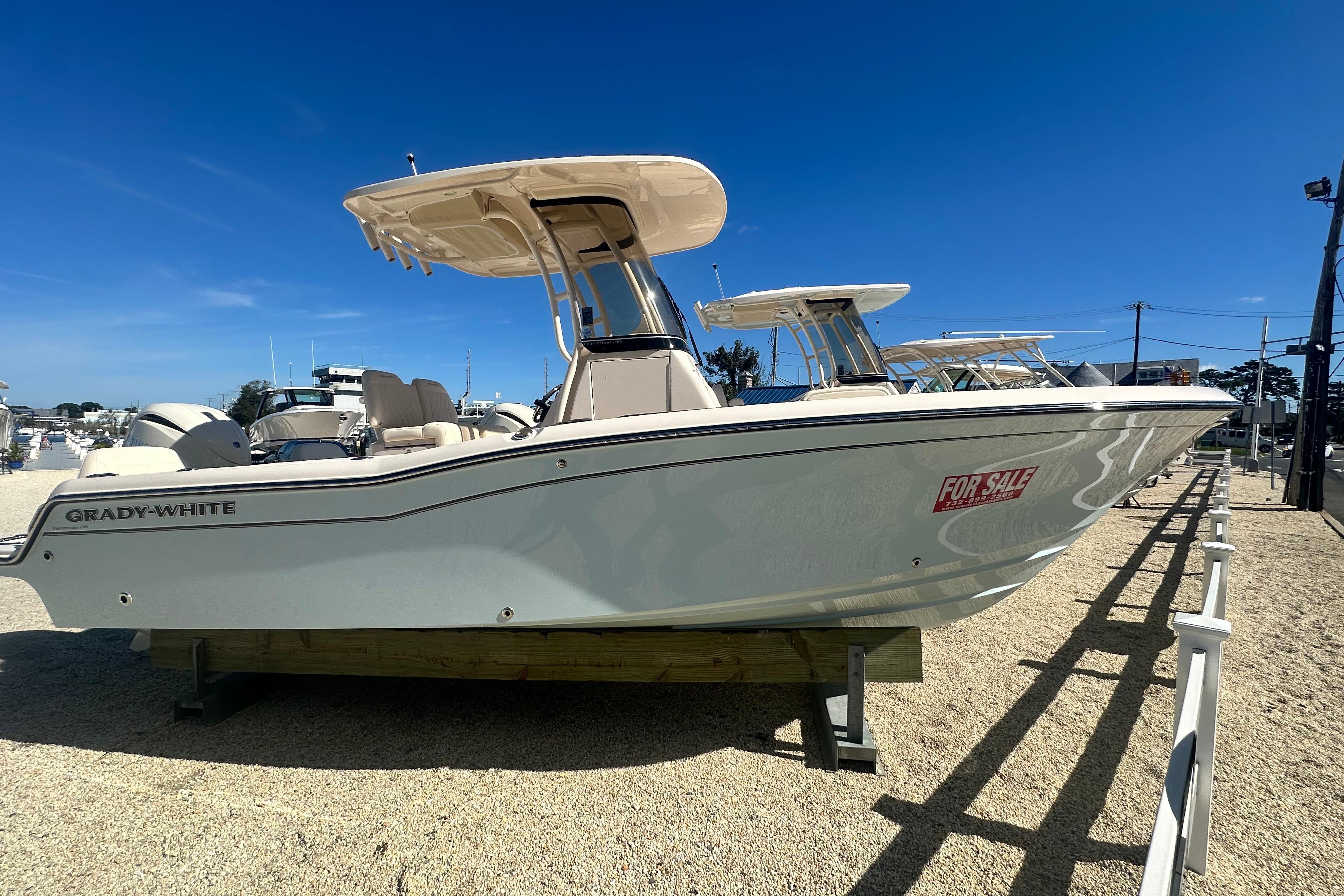 Grady-White Fisherman 216 2026 Grady-White Fisherman 216 boat for sale, displayed outdoors under clear blue sky.