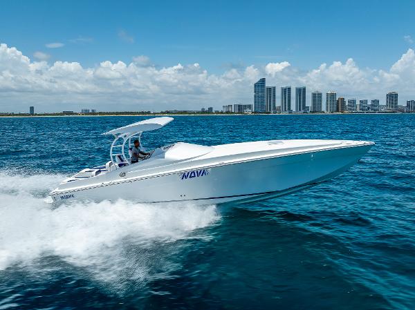 Nova 39 Sport 2020 Nova 39 Sport boat cruising on ocean with city skyline in background.