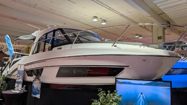Beneteau Antares 9 2025 Beneteau Antares 9 boat displayed indoors at a boat show.
