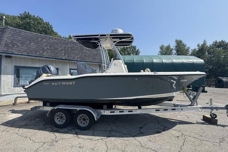 Key West 219fs 2019 Key West 219fs boat on trailer, parked outdoors under clear sky.