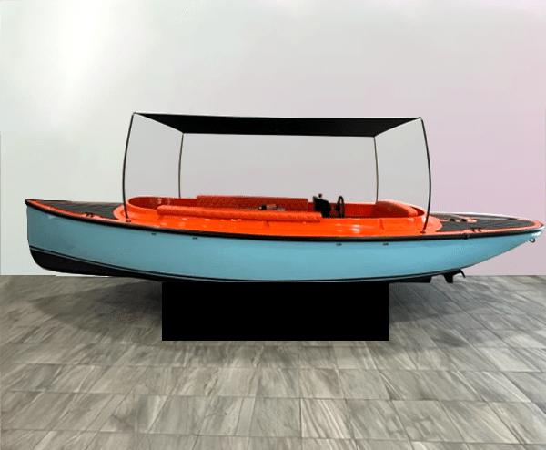 Vision Marine Technologies Fantail 217 2023 Vision Marine Technologies Fantail 217 boat with orange and blue design, displayed indoors.