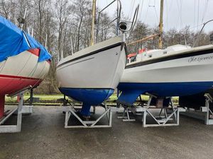 Victoire 26 Sailboats on stands, including a 1976 Victoire 26, in a boatyard setting.