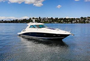 Sea Ray 450 Sundancer 2011 Sea Ray 450 Sundancer yacht on calm water under blue sky.
