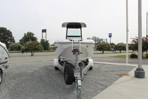 Scarab 255 Open ID 2023 Scarab 255 Open ID boat on trailer in outdoor setting.