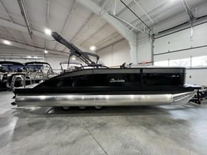 Barletta A22UC 2025 Barletta A22UC pontoon boat in showroom, side view.